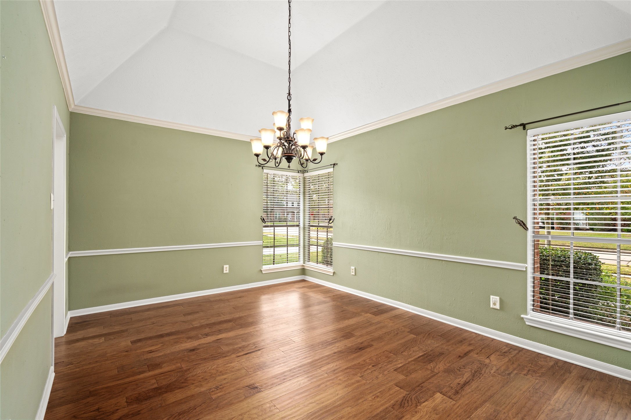 16106 Ridge Park Drive Houston, TX 77095 - Photo 7 of 23 a view of wooden floor and windows in a room
