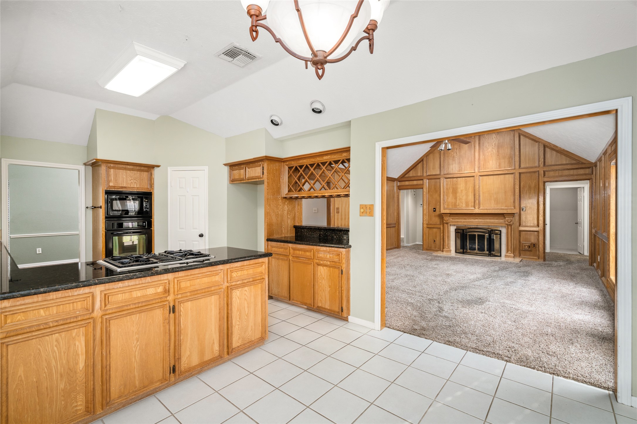 16106 Ridge Park Drive Houston, TX 77095 - Photo 8 of 23 a kitchen with cabinets and wooden floor