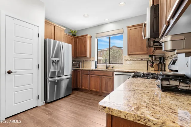 a bathroom with a sink toilet and a mirror