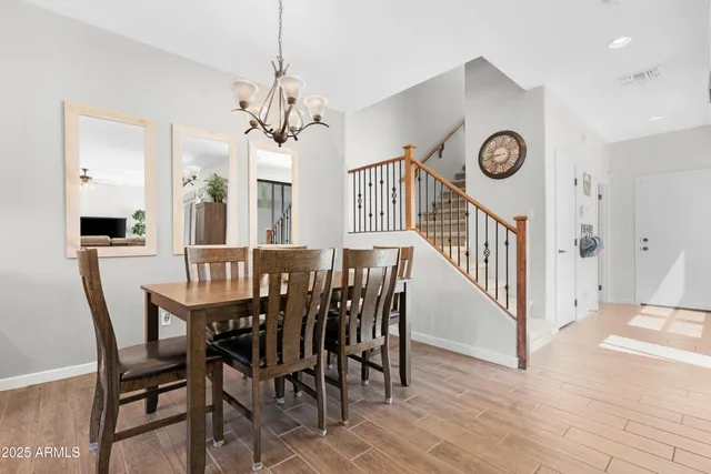 a bedroom with a bed and a television