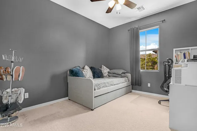 a bedroom with a bed and a walk in closet