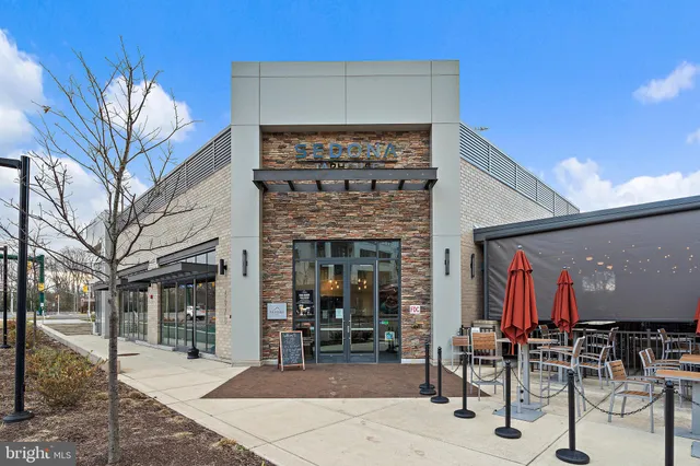 a view of a chairs and table in a patio