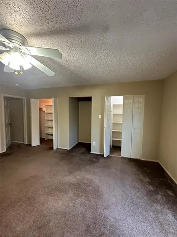 a kitchen with a sink and a stove top oven