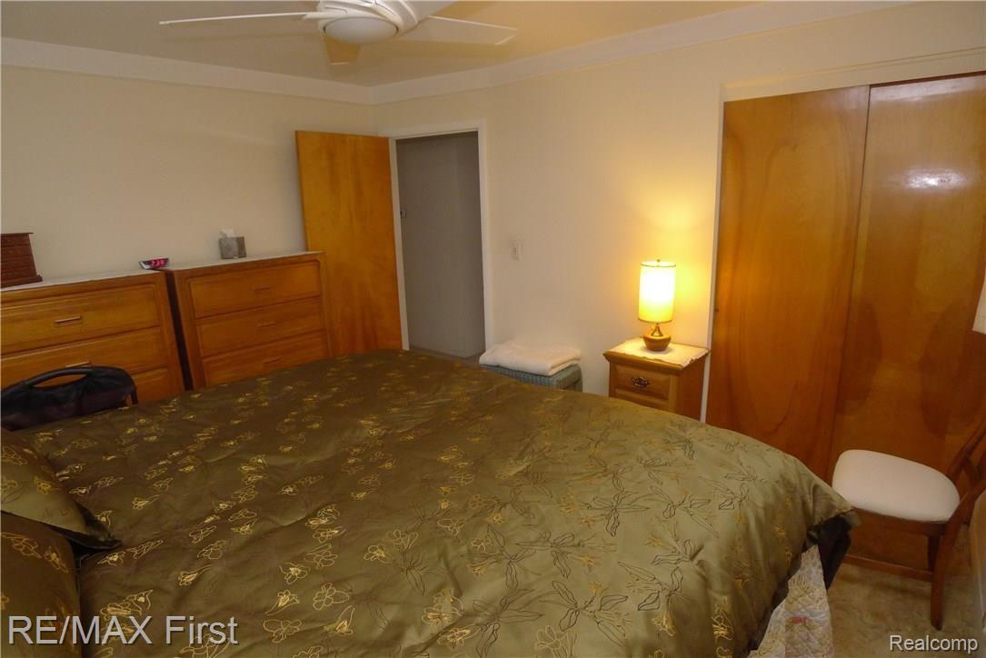 19411 Stephens Road Eastpointe, MI 48021 - Photo 22 of 48 MBR - ceiling fan - original well maintained wood doors.