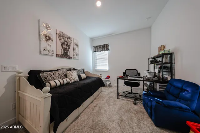 a bathroom with a granite countertop sink a mirror and a shower