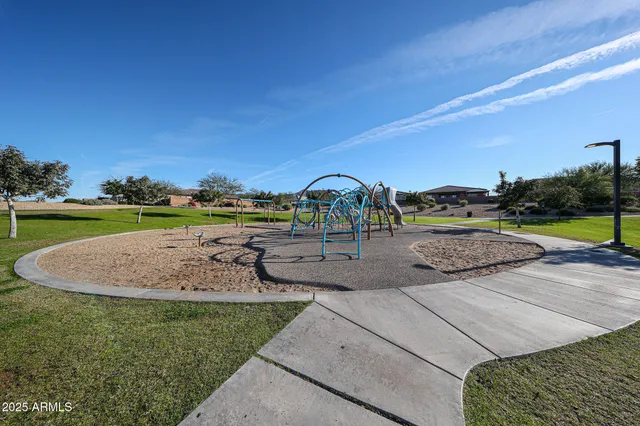 a view of a chairs and table in the patio