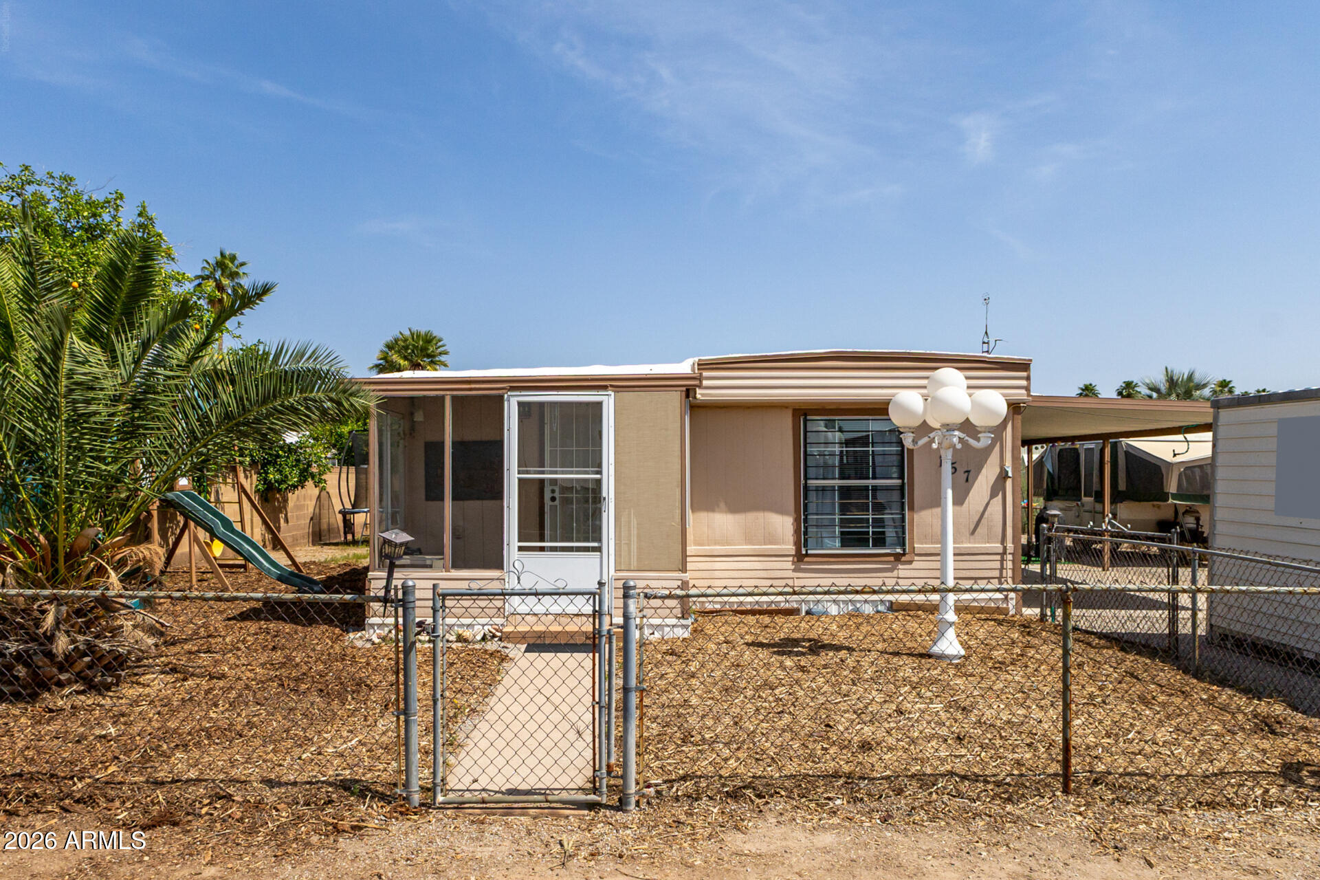 157 North 113th Way Apache Junction, AZ 85120 - Photo 1 of 27 a view of a house with backyard