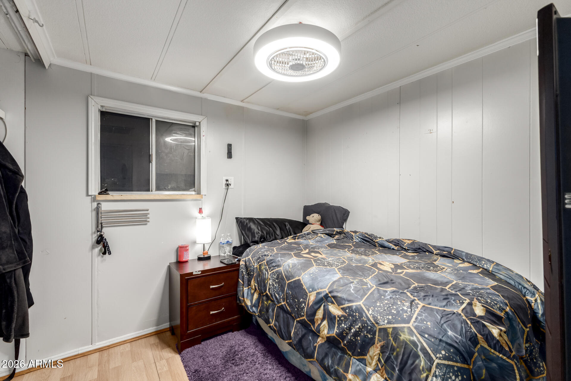 157 North 113th Way Apache Junction, AZ 85120 - Photo 14 of 27 a bedroom with a bed and a mirror