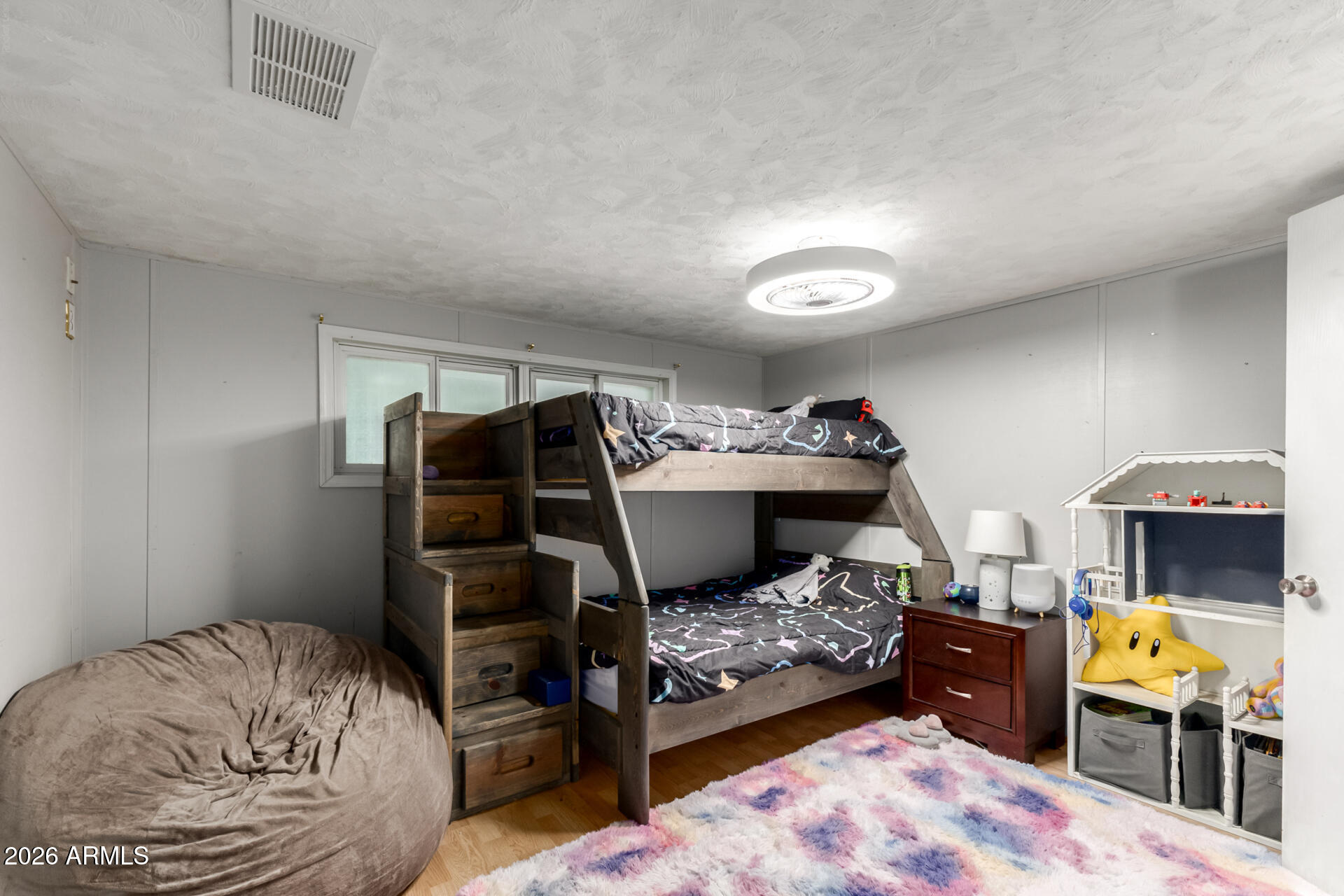 157 North 113th Way Apache Junction, AZ 85120 - Photo 17 of 27 a bedroom with a bed and a tv