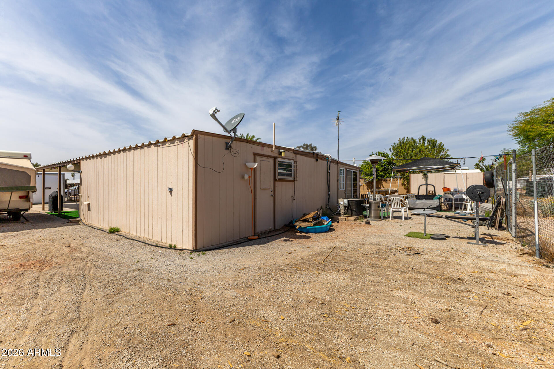 157 North 113th Way Apache Junction, AZ 85120 - Photo 26 of 27 a view of a backyard of the house