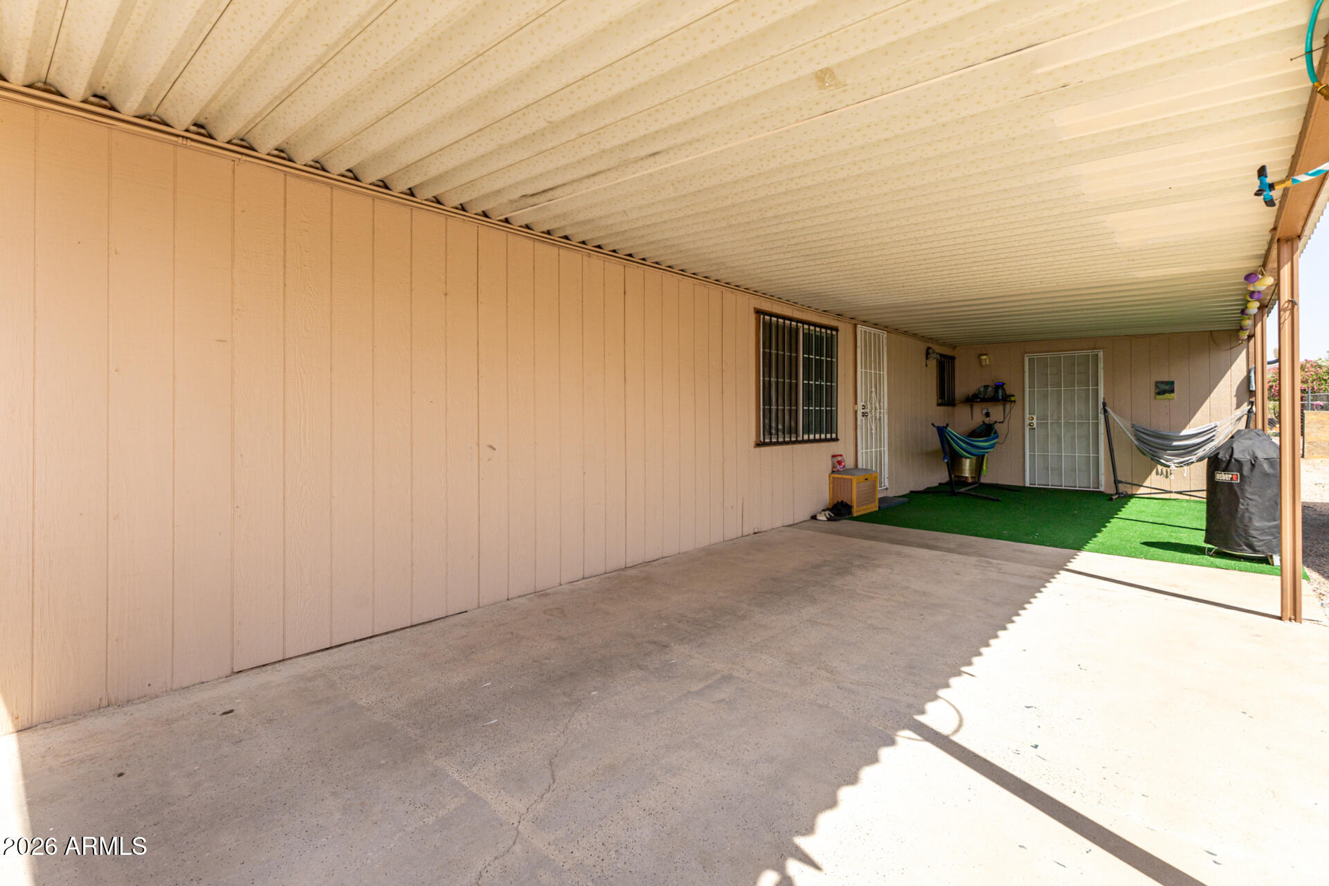 157 North 113th Way Apache Junction, AZ 85120 - Photo 4 of 27 a view of a house with a backyard
