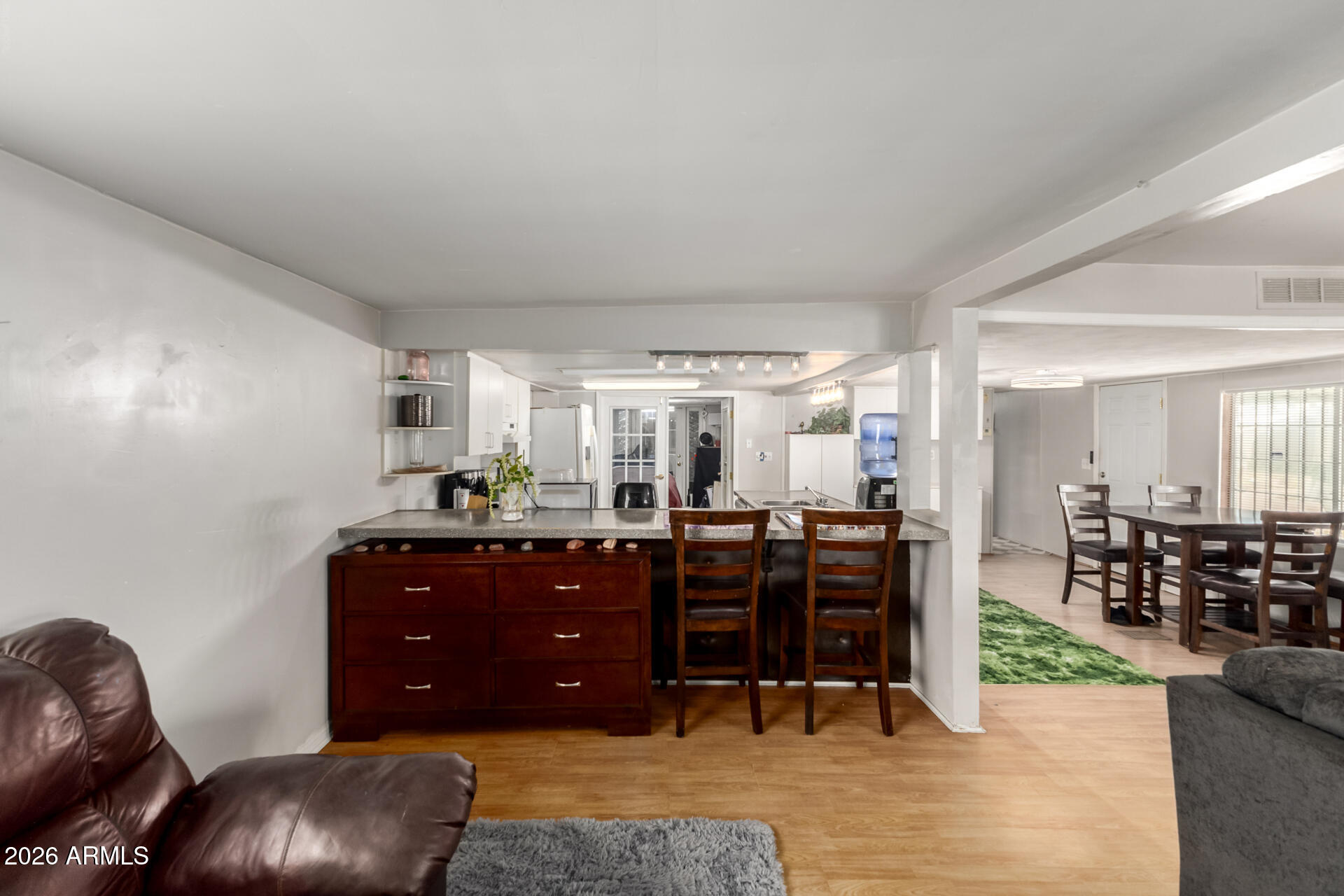 157 North 113th Way Apache Junction, AZ 85120 - Photo 10 of 27 a living room with furniture and wooden floor