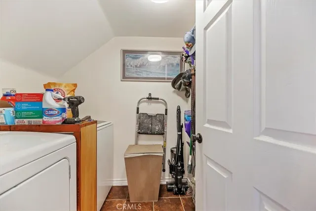 a bathroom with a sink toilet and mirror