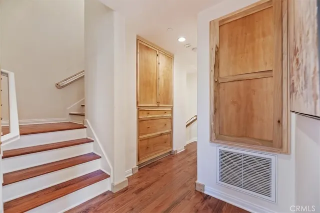 a view of front door with wooden floor
