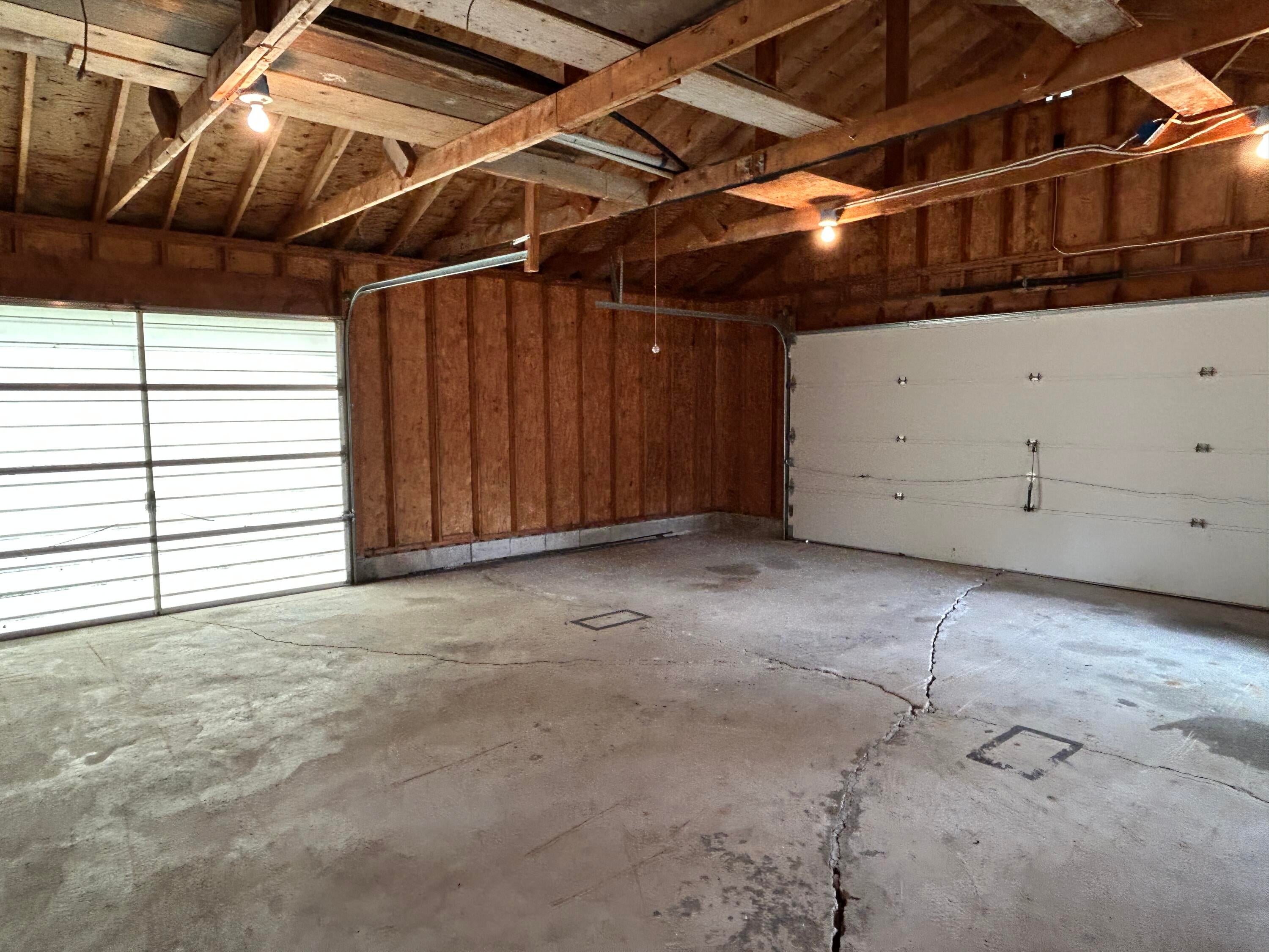 7126 Grand Point Road Presque Isle, MI 49777 - Photo 45 of 47 Detached garage extra garage door