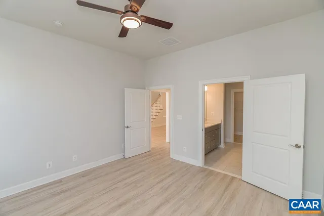 a bathroom with a sink double vanity and a mirror