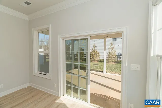 a view of a living room and window