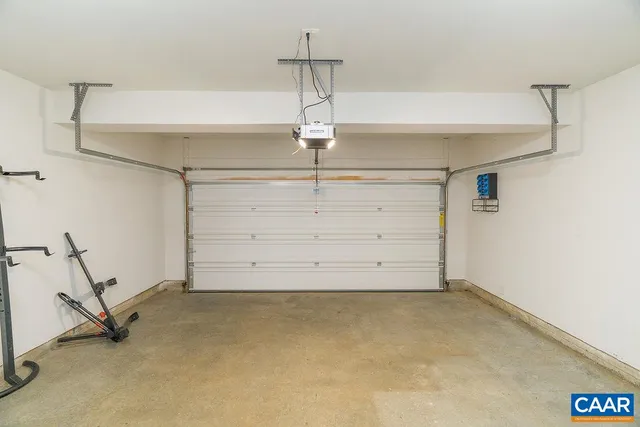 a front view of a house with a garage