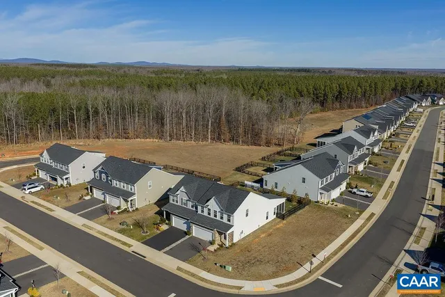 a view of a lake with a yard