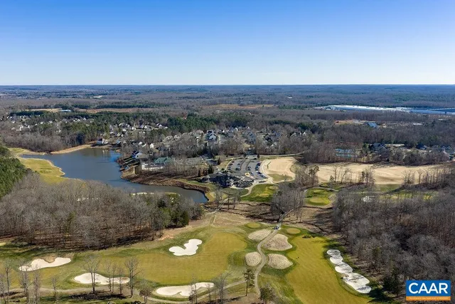 swimming pool view with couple of furniture