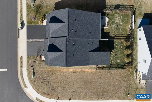 a bedroom with bed and mirror