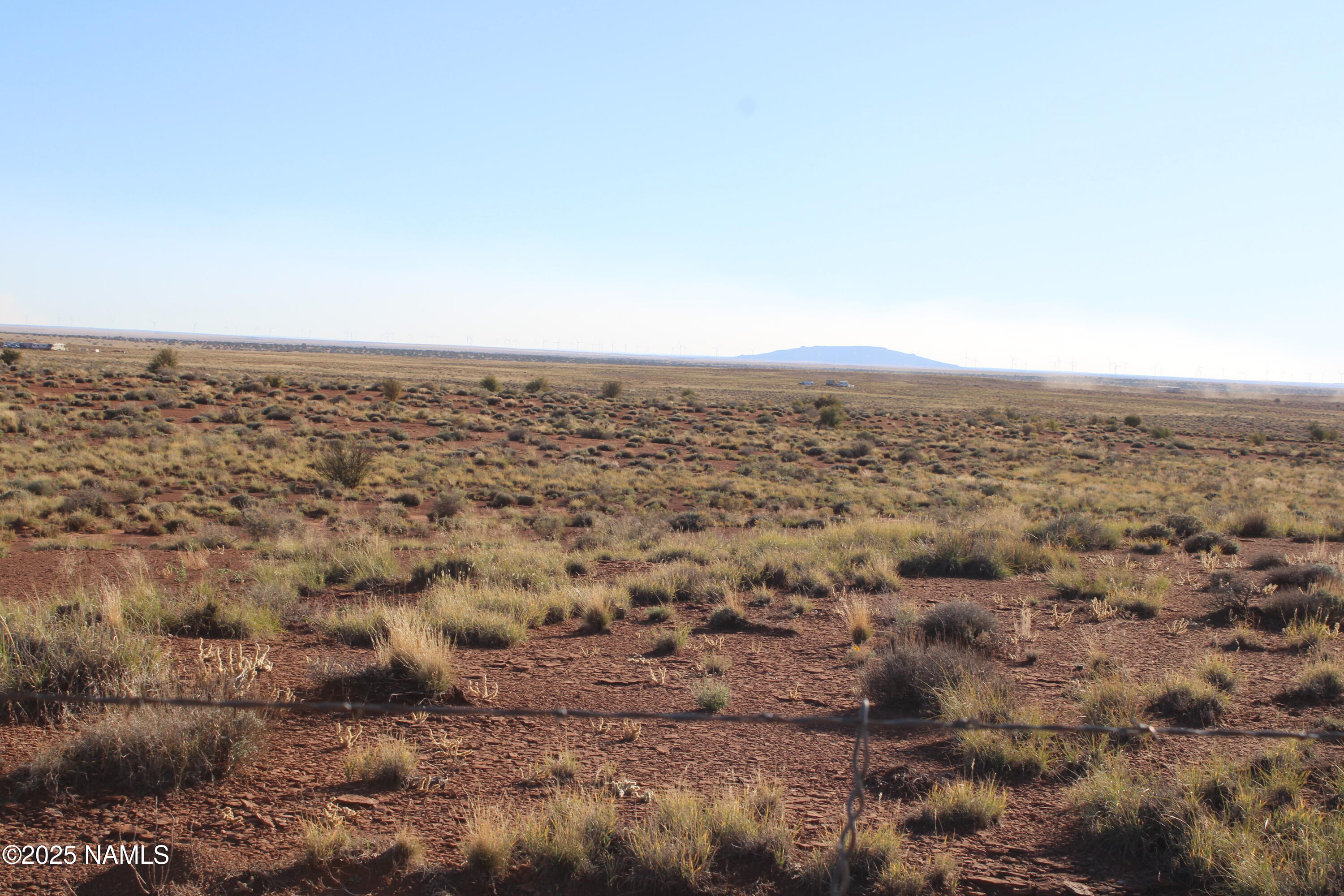 148 Red Dog Road Winslow, AZ 86047 - Photo 22 of 28 an aerial view of house with yard and mountain view in back