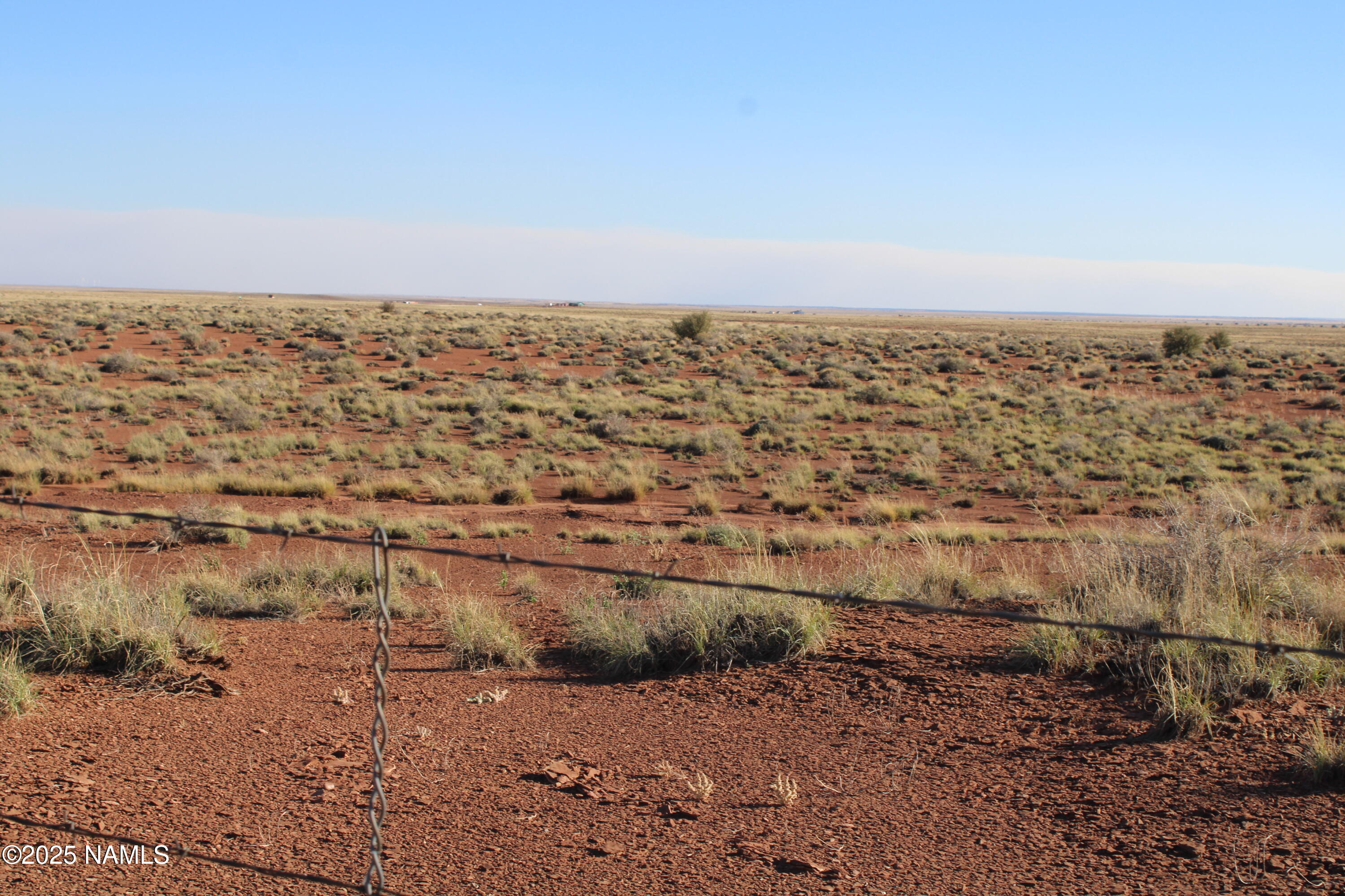 148 Red Dog Road Winslow, AZ 86047 - Photo 24 of 28 a view of an ocean beach and mountain