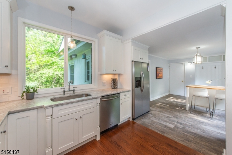 32 Parsonage Hill Road Short Hills, NJ 07078 - Photo 14 of 49 a kitchen with a sink cabinets and wooden floor