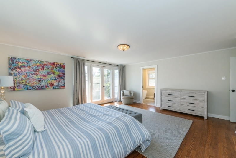 32 Parsonage Hill Road Short Hills, NJ 07078 - Photo 23 of 49 a bedroom with a bed and a flat screen tv