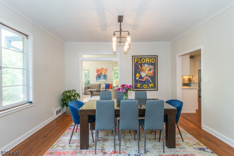 32 Parsonage Hill Road Short Hills, NJ 07078 - Photo 8 of 49 a view of a dining room with furniture window and wooden floor
