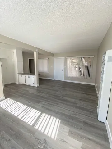 a bathroom with a toilet and a bath tub