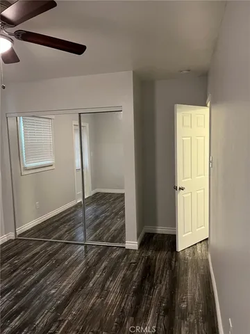 a bathroom with a toilet and a bath tub