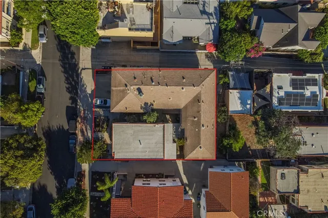 an aerial view of a building with outdoor space