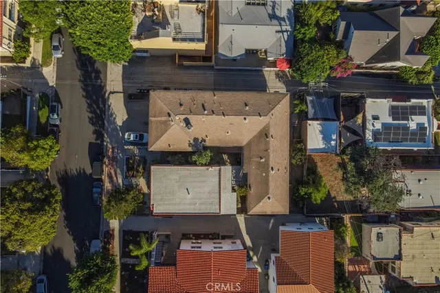 an aerial view of a building with outdoor space