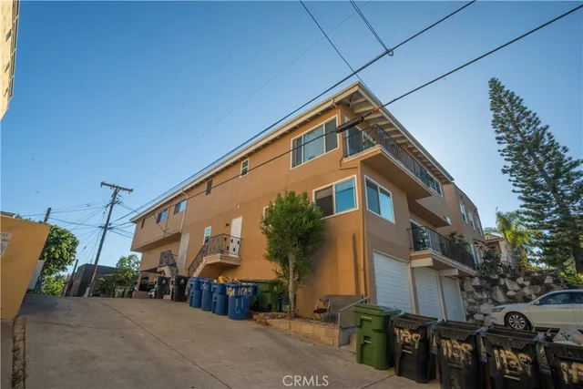 a front view of a building with street view