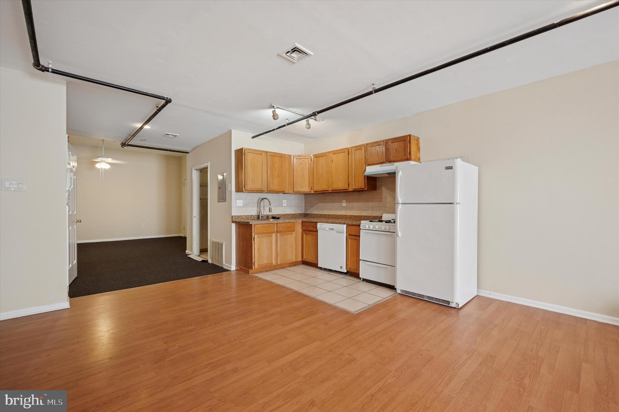 128 North 3rd Street, Unit 2R Philadelphia, PA 19106 - Photo 3 of 16 a view of kitchen with wooden floor