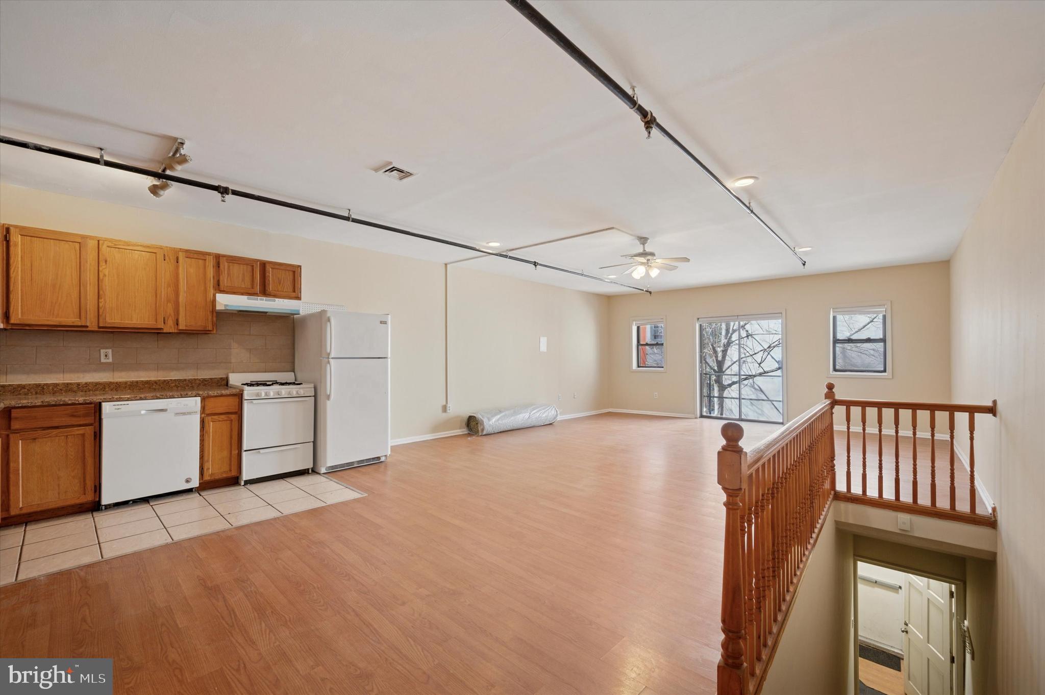 128 North 3rd Street, Unit 2R Philadelphia, PA 19106 - Photo 7 of 16 a view of a kitchen with a sink and dishwasher