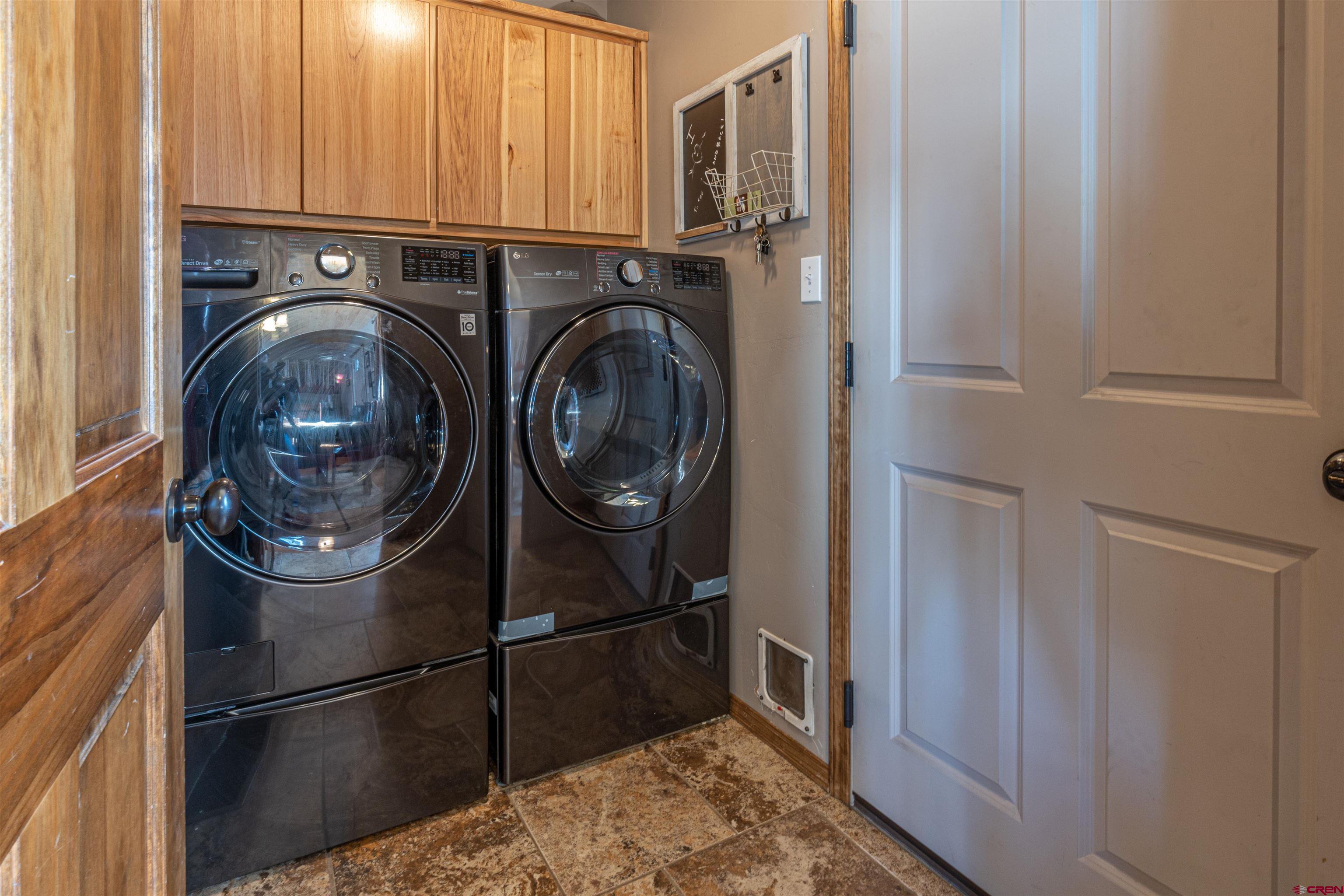 809 Hickory Ridge Bayfield, CO 81122 - Photo 8 of 24 a close view of utility and utility room with racks on the wall