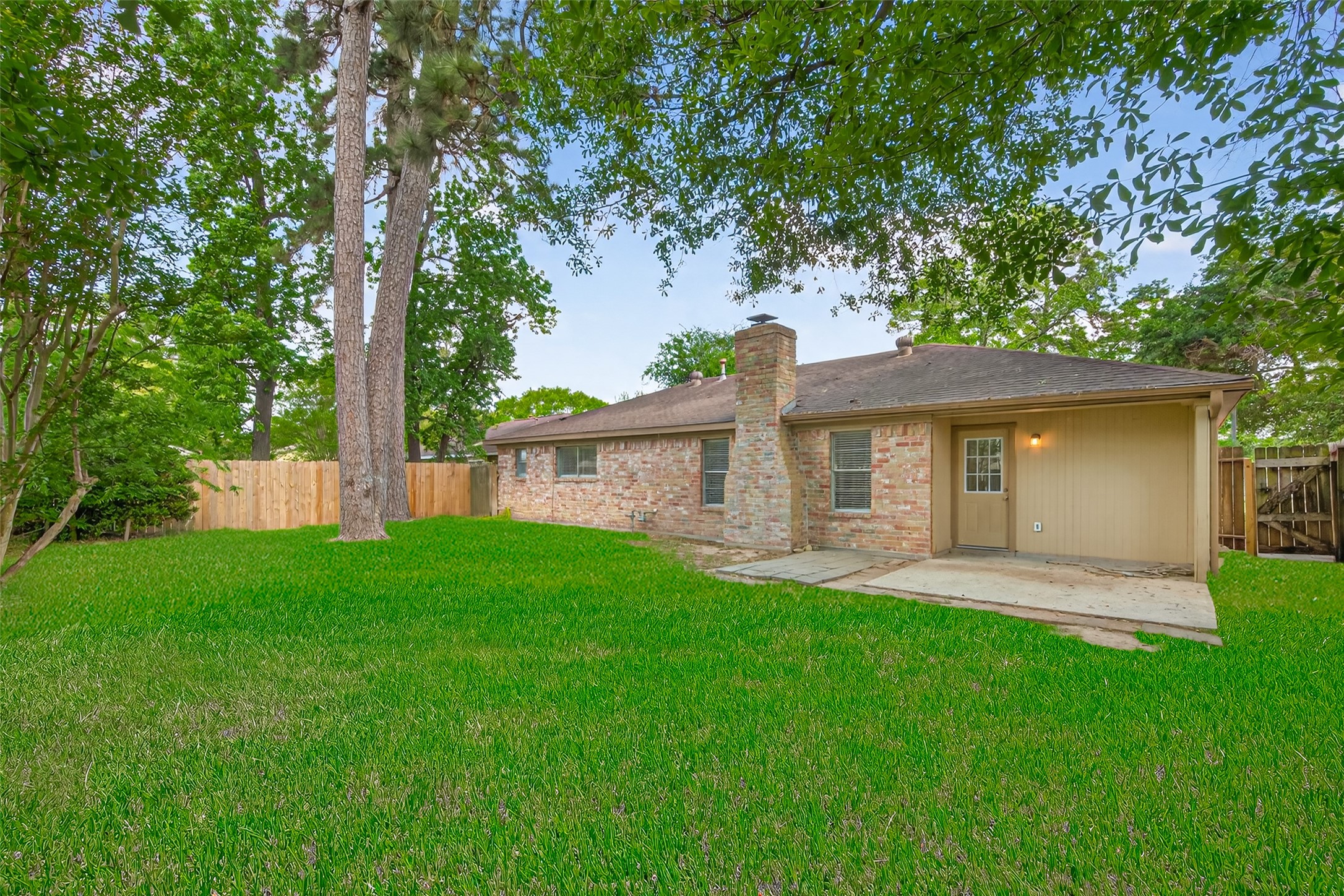 23919 Farm Hill Drive Spring, TX 77373 - Photo 40 of 41 a front view of a house with a yard and green space