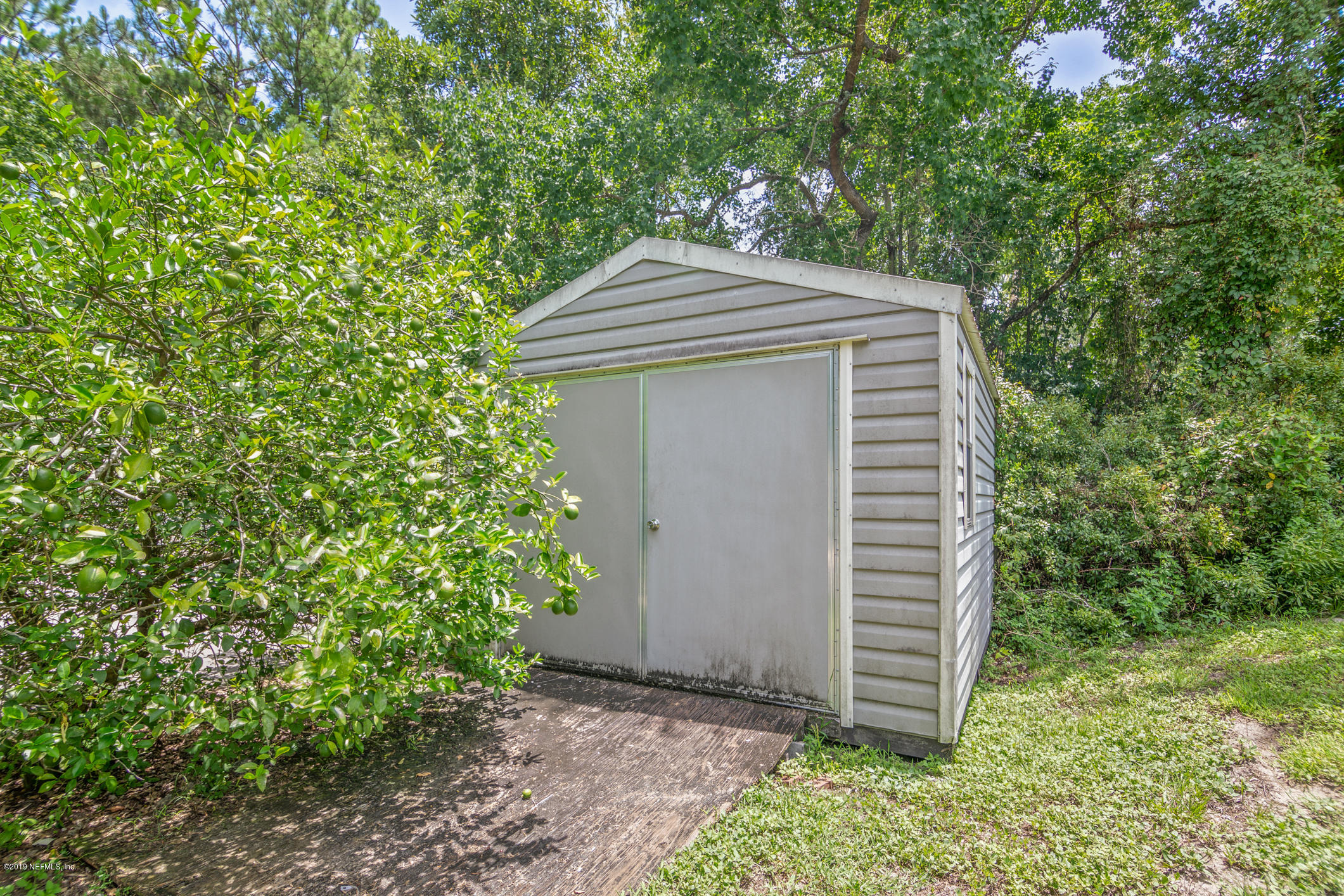1665 Scott Road St. Johns, FL 32259 - Photo 12 of 54 a house view with a backyard space