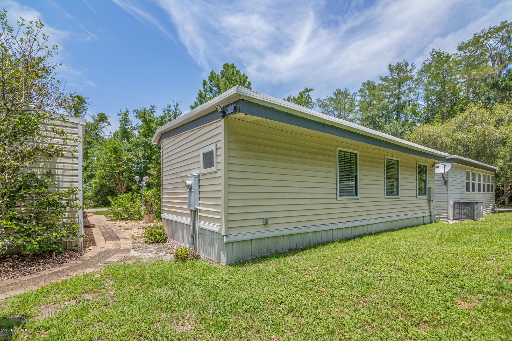 1665 Scott Road St. Johns, FL 32259 - Photo 13 of 54 a backyard of a house with seating space