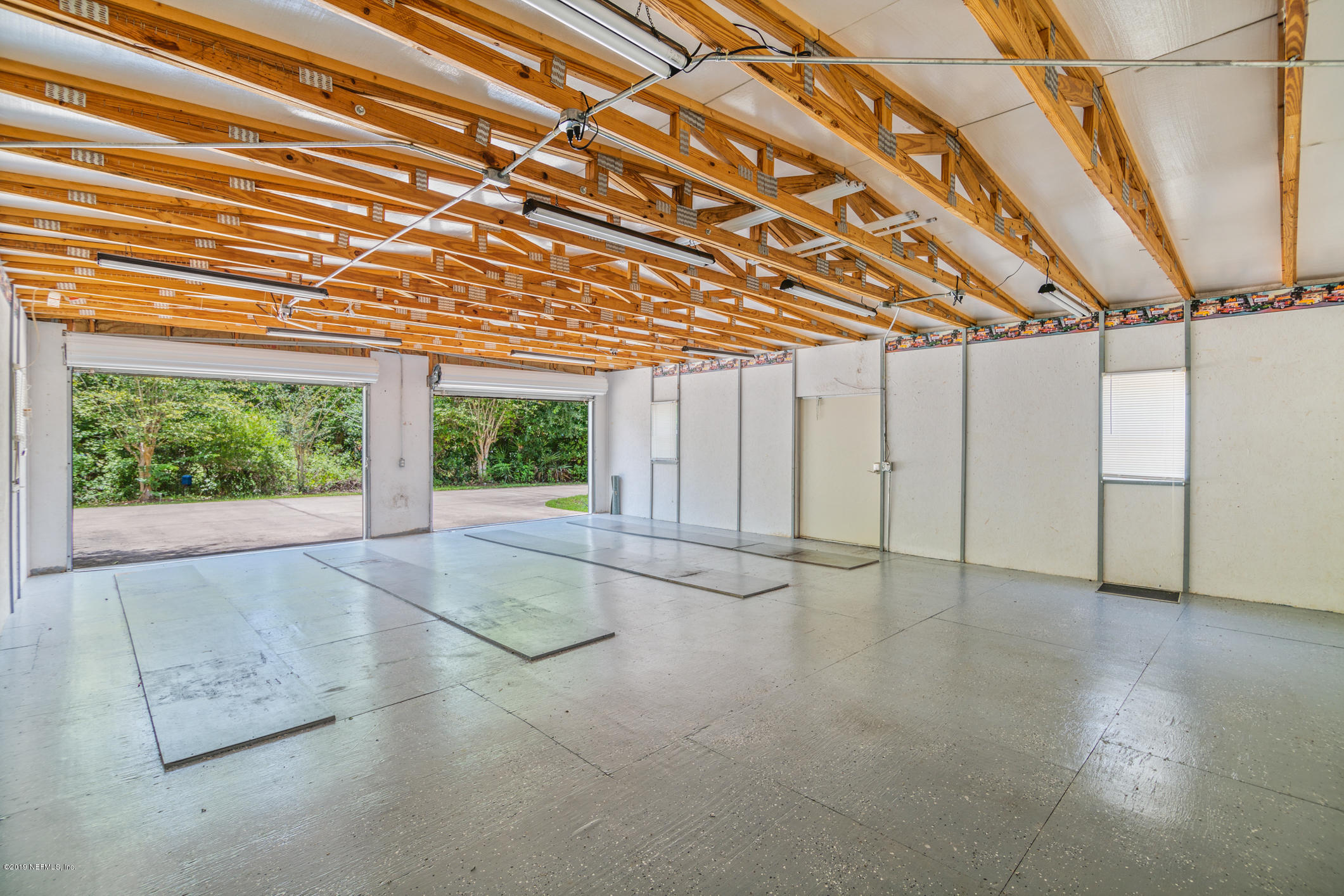 1665 Scott Road St. Johns, FL 32259 - Photo 18 of 54 a view of a room with wooden walls