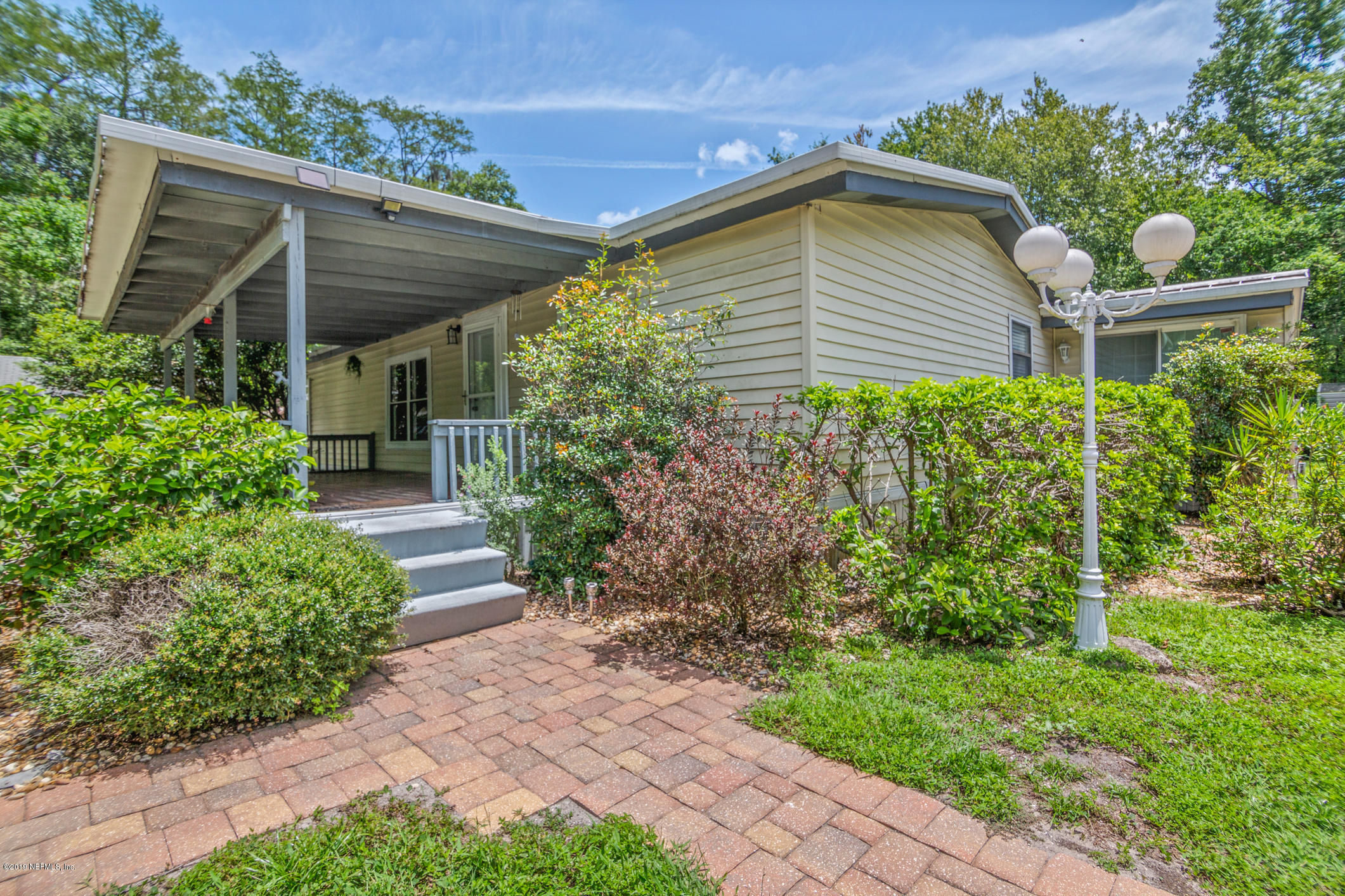 1665 Scott Road St. Johns, FL 32259 - Photo 19 of 54 a front view of house with garden