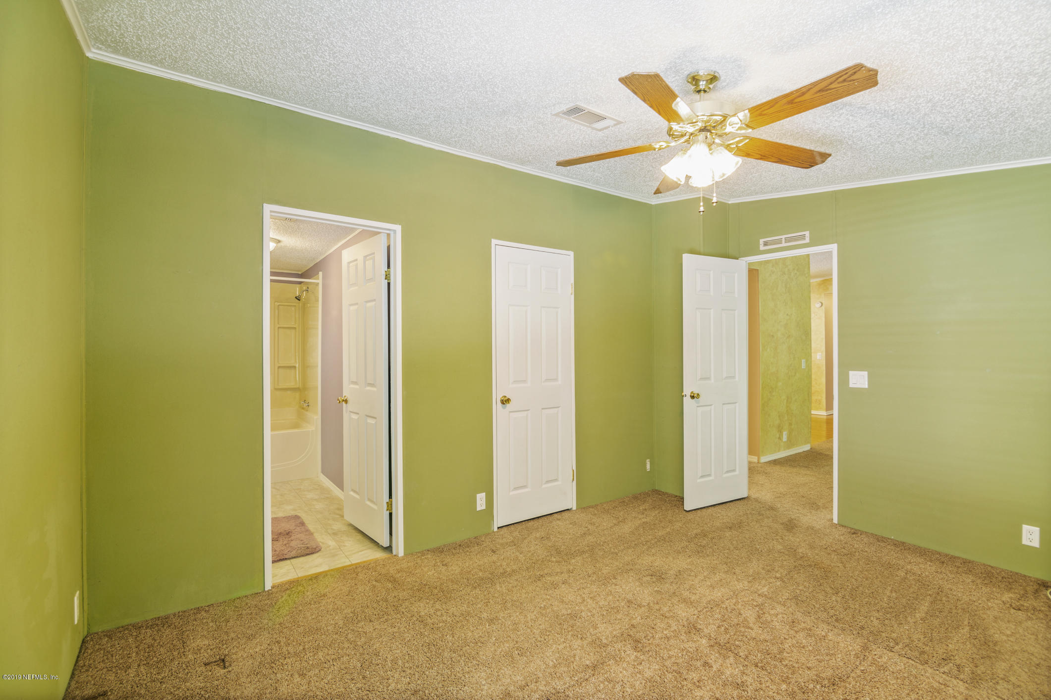 1665 Scott Road St. Johns, FL 32259 - Photo 42 of 54 a view of a hallway with a ceiling fan