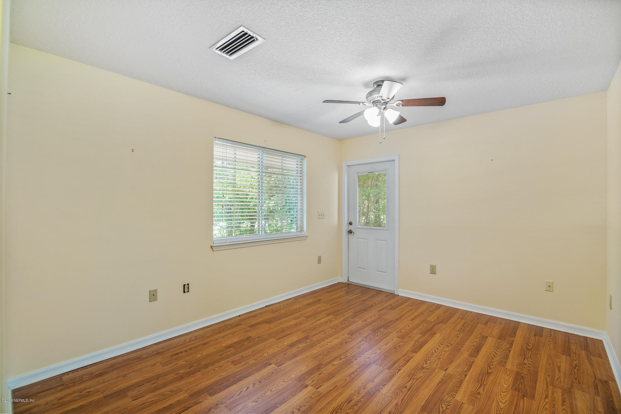 1665 Scott Road St. Johns, FL 32259 - Photo 45 of 54 wooden floor in an empty room with a window