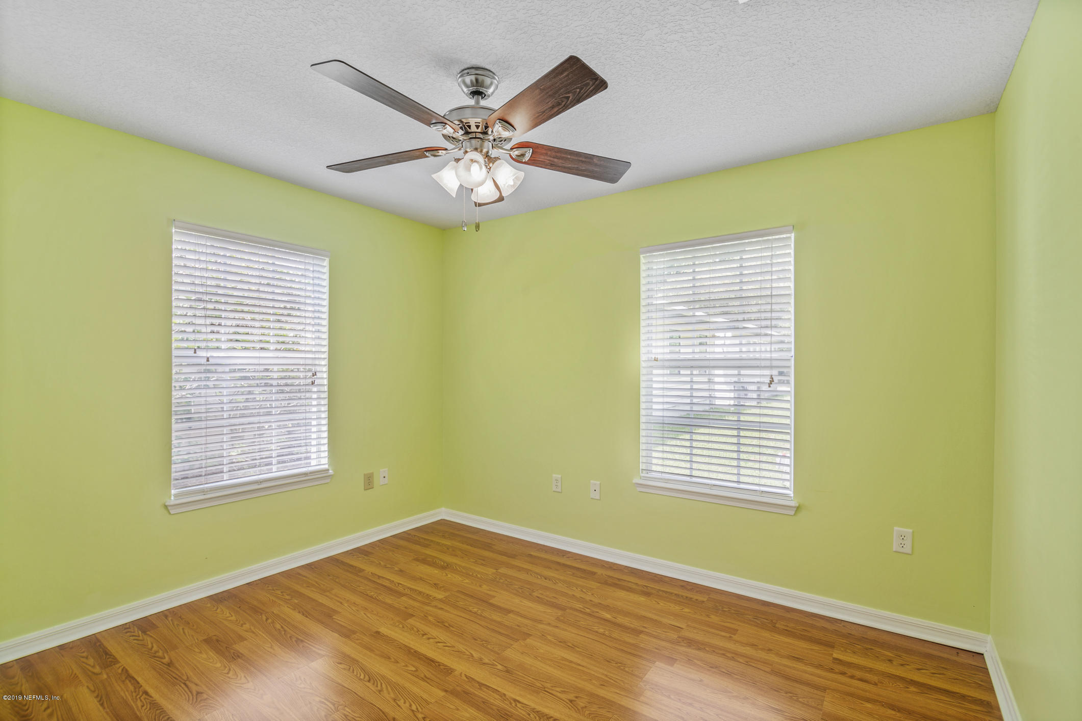 1665 Scott Road St. Johns, FL 32259 - Photo 46 of 54 a view of an empty room with wooden floor and a window