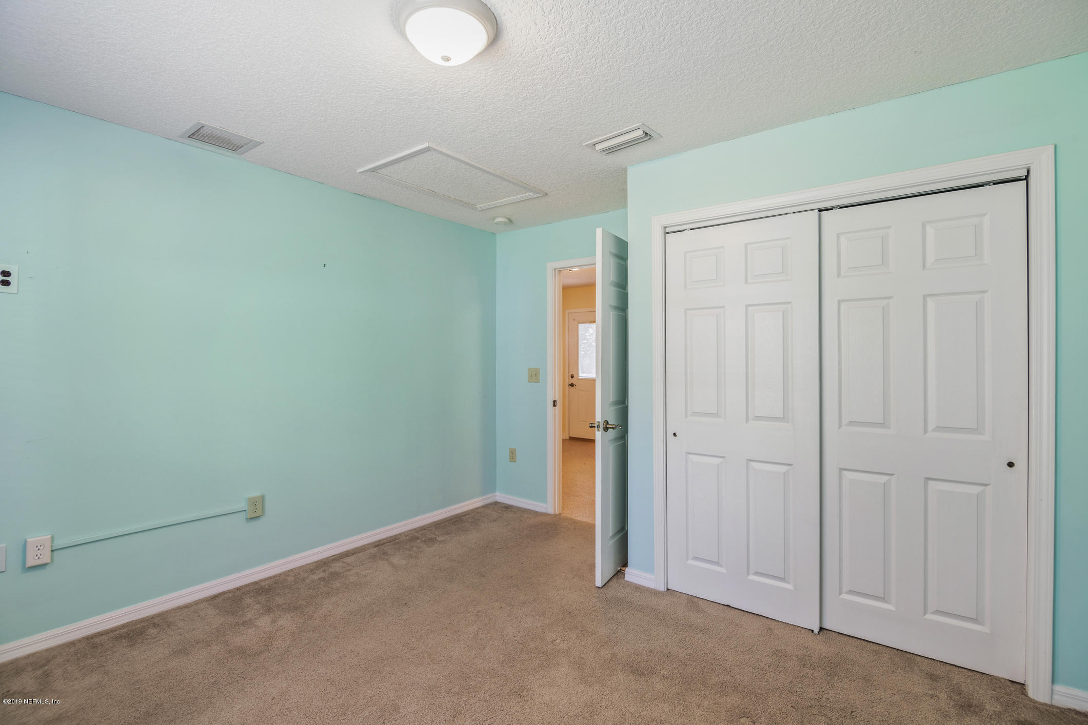 1665 Scott Road St. Johns, FL 32259 - Photo 52 of 54 an empty room with closet area