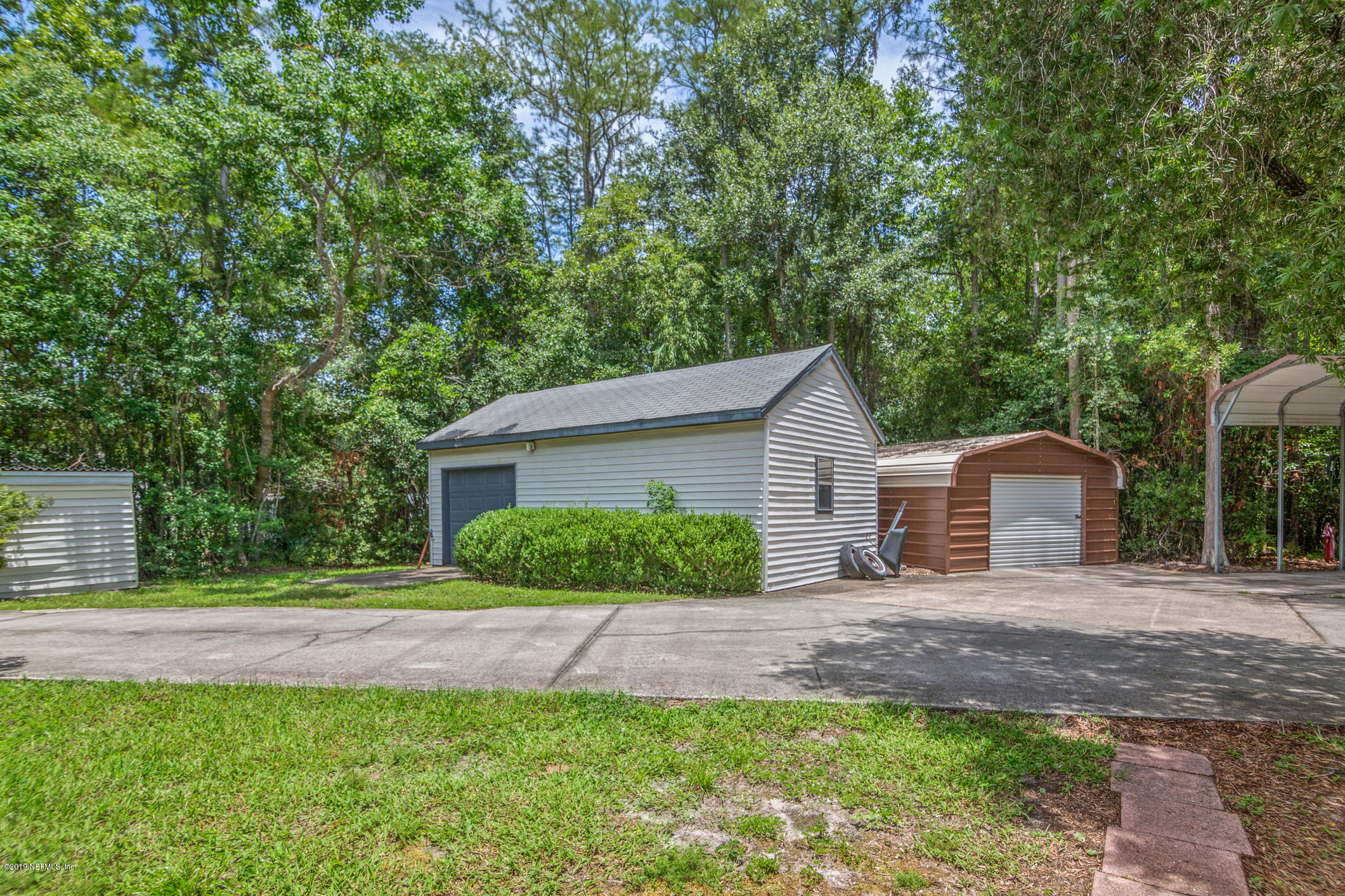 1665 Scott Road St. Johns, FL 32259 - Photo 9 of 54 a front view of house with yard and green space