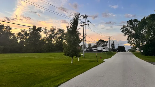 a view of a field with a yard