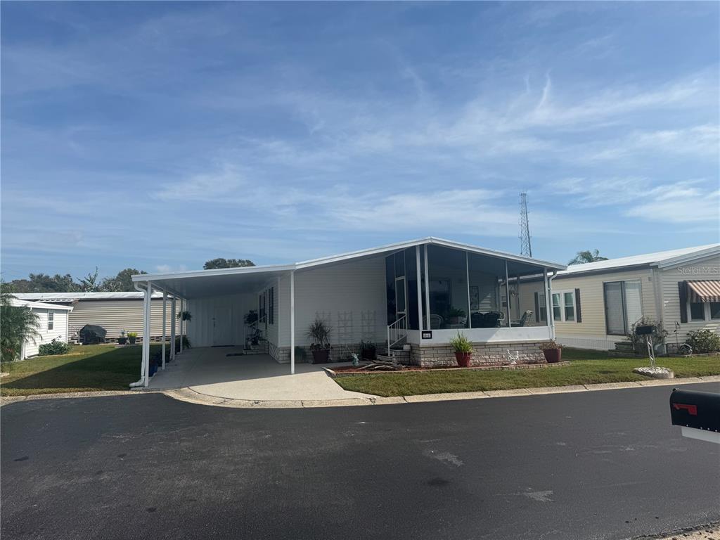 a front view of building with street